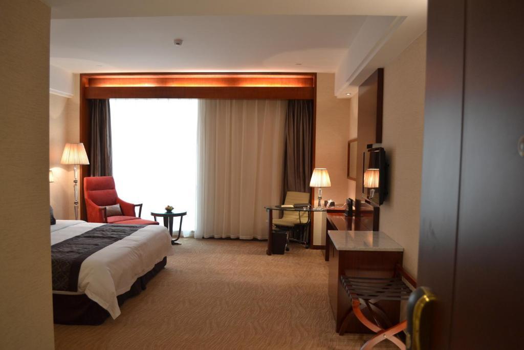 Wuhan Tianchimel Hotel Номер фото