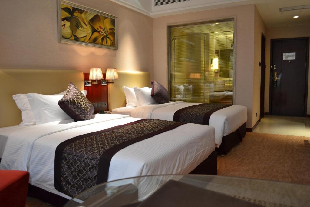 Wuhan Tianchimel Hotel Номер фото
