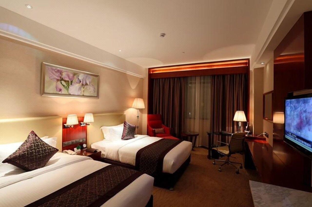 Wuhan Tianchimel Hotel Экстерьер фото